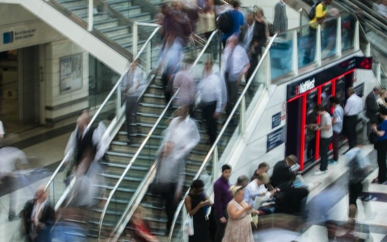blurred-image-of-people-in-underground_1600x1071