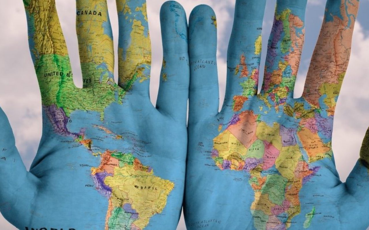 hands-world-map-global-earth-globe-blue-creative_1600x1068